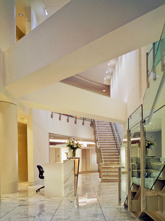 Side View of Two-Story Reception Area with Double Staircases