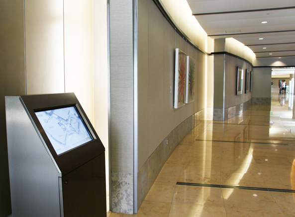 Secondary Entrance to Hospital with Digital Wayfinding Kiosk in Foreground